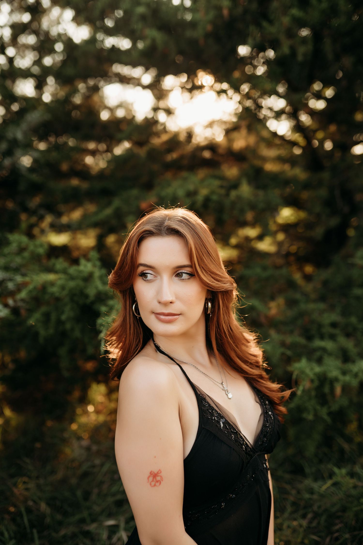 Natural portrait session of woman smiling in golden hour light