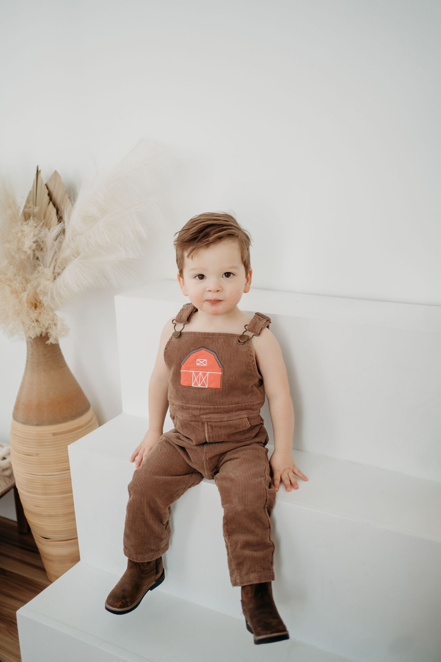 Toddler smiling during Lawrence Kansas family photography session