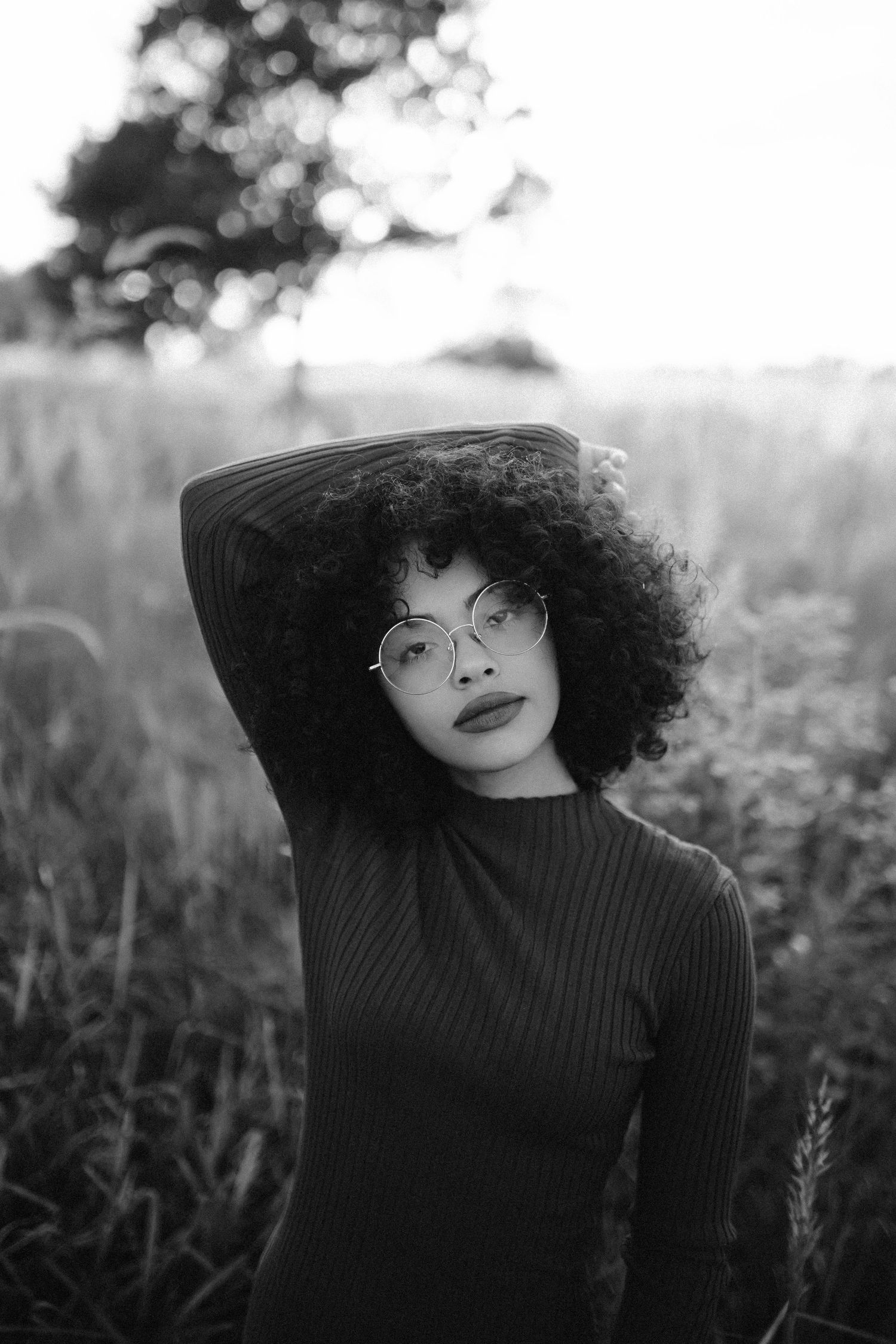 Natural portrait session of woman smiling in golden hour light