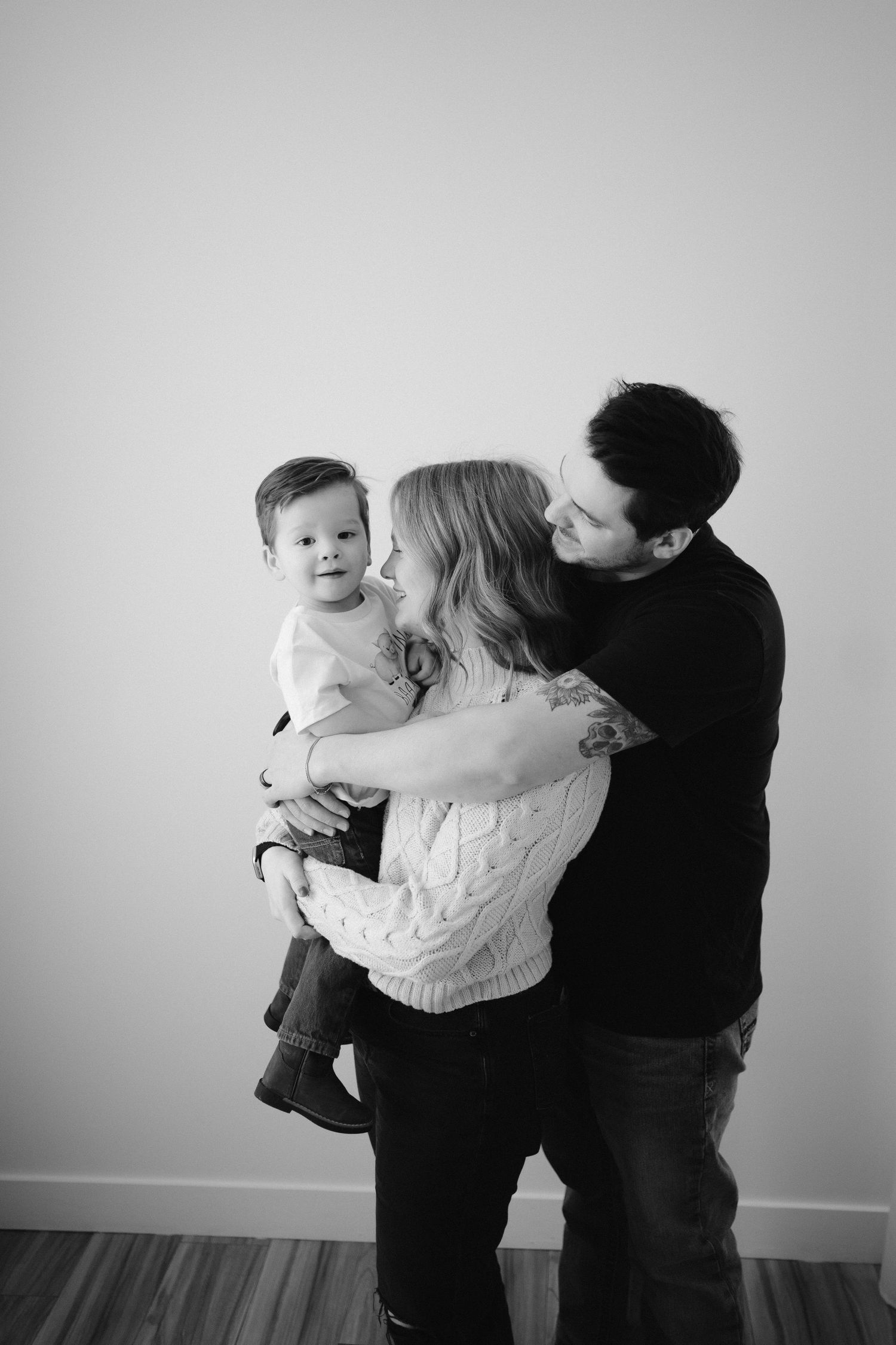 Toddler smiling during Lawrence Kansas family photography session