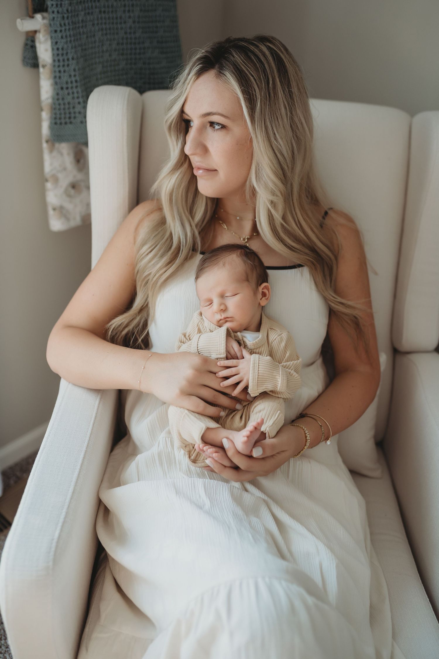 Newborn baby sleeping during soft natural newborn photography session
