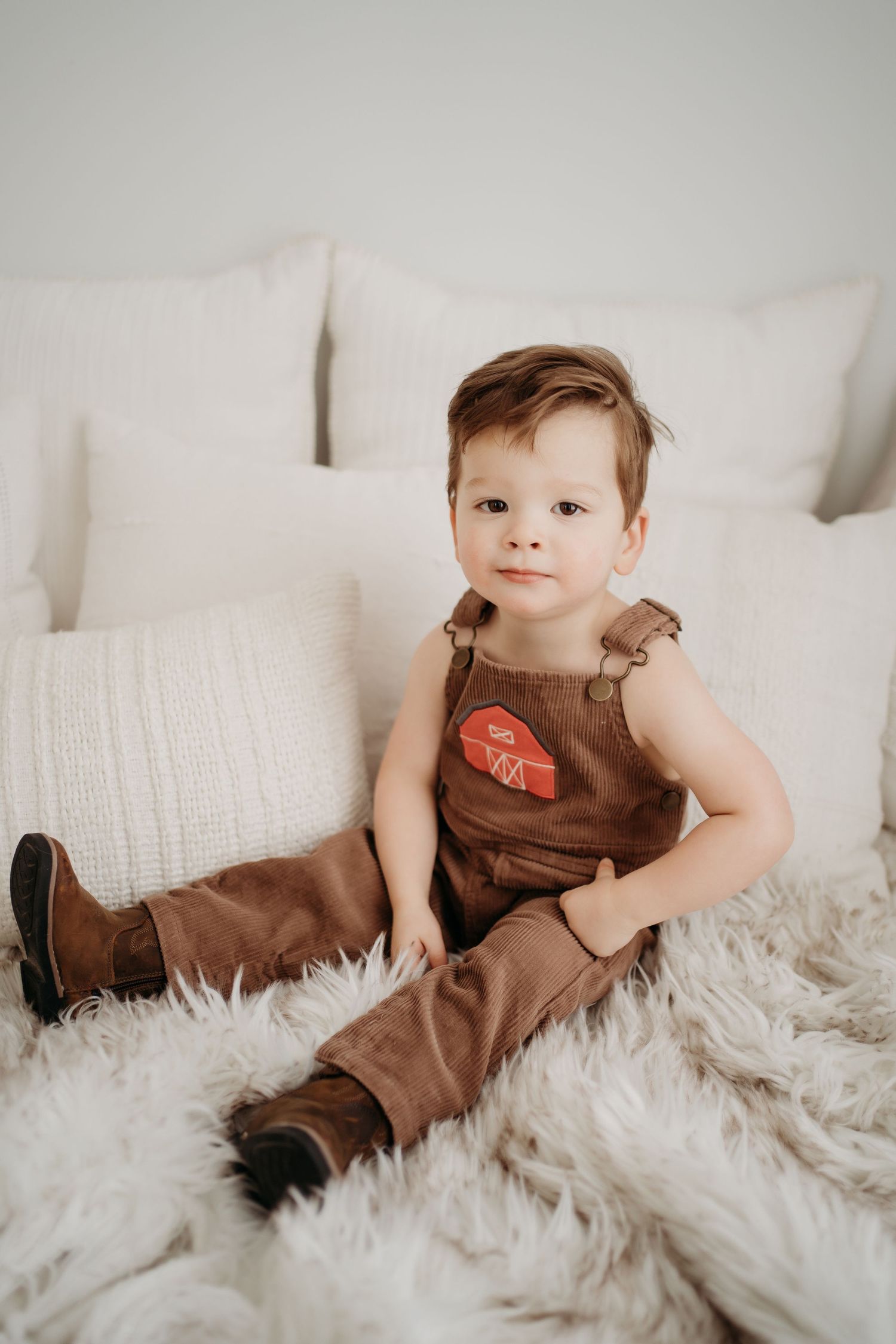 Toddler smiling during Lawrence Kansas family photography session