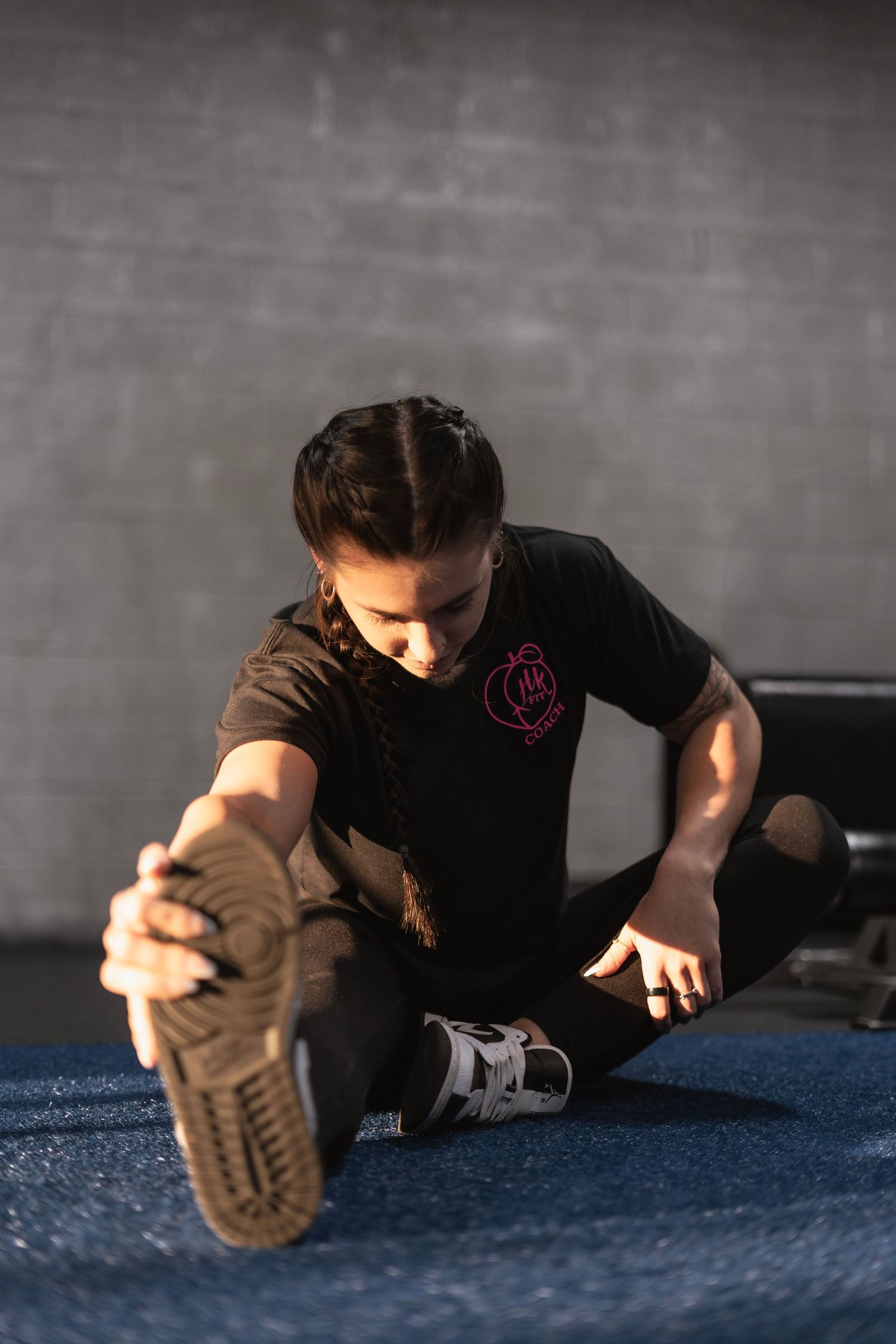 Girl stretching before lift.