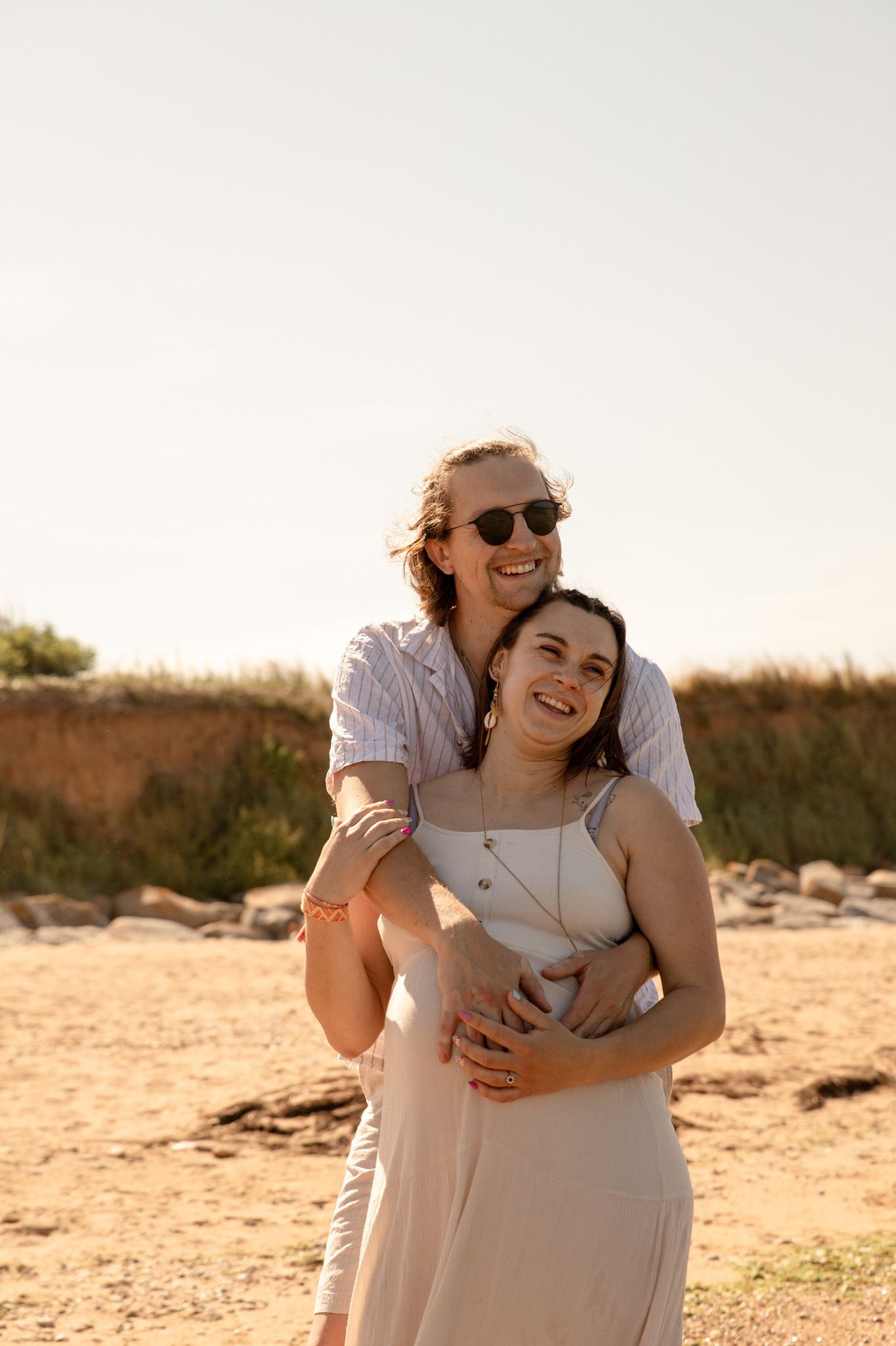 Séance photo grossesse en couple à la plage de luc sur mer photographe caen