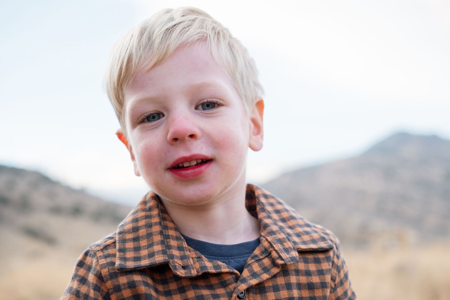 Portrait of blond boy, smiling.