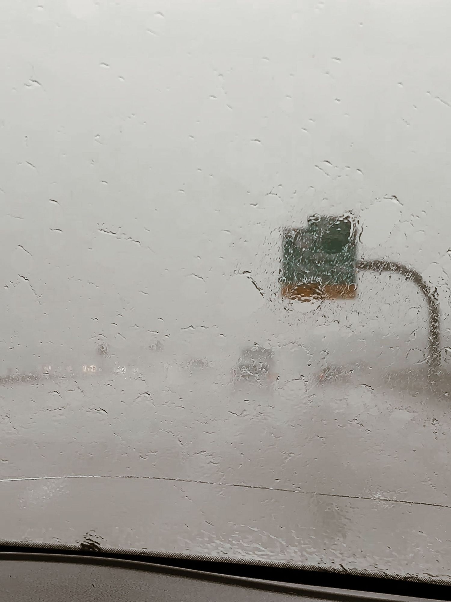 Denver photographer's project 365, May, view from inside car looking out front windshield on very rainy day.