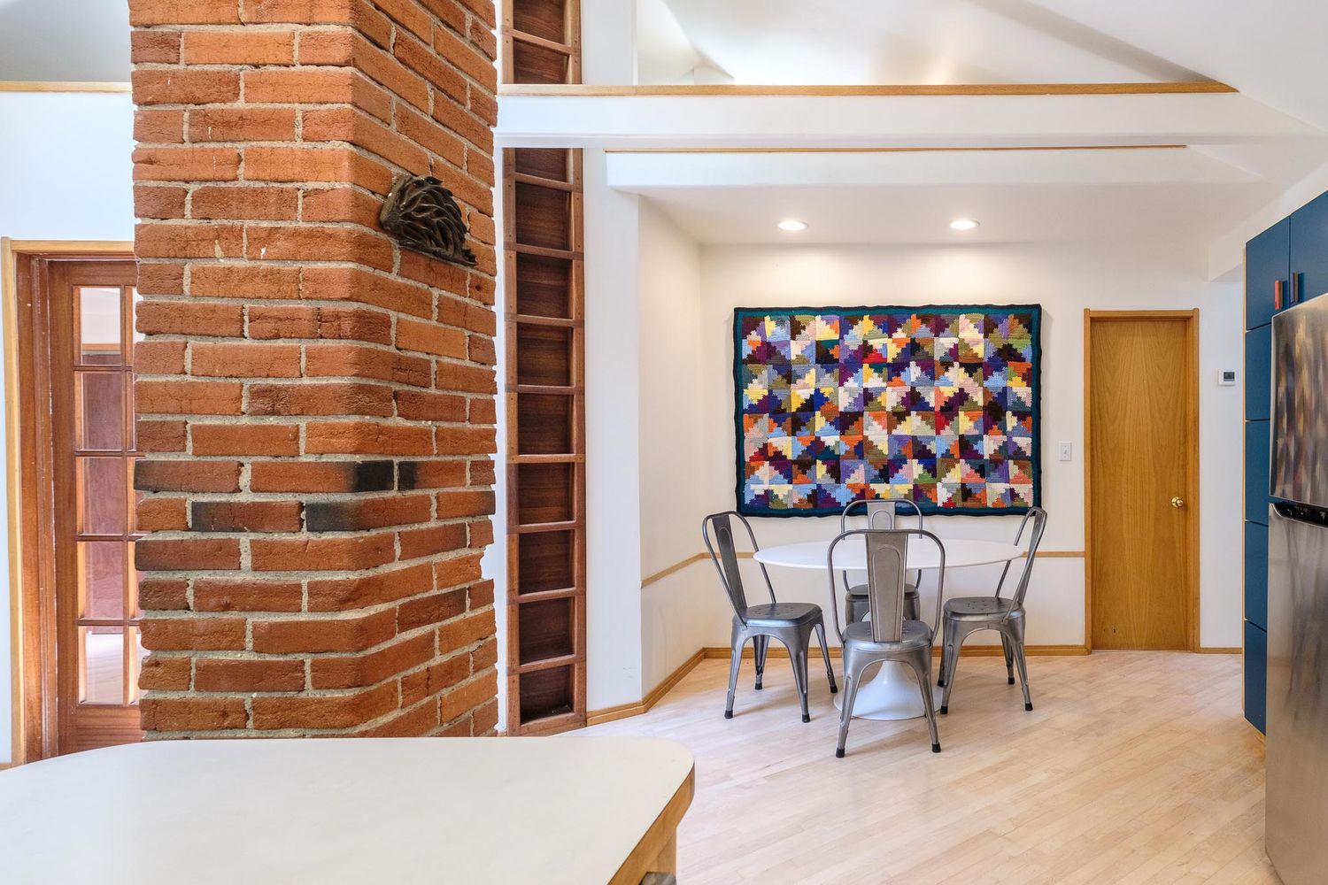 Airbnb photo Denver Colorado professional Denver photographer, brickwork and view of dining room table.