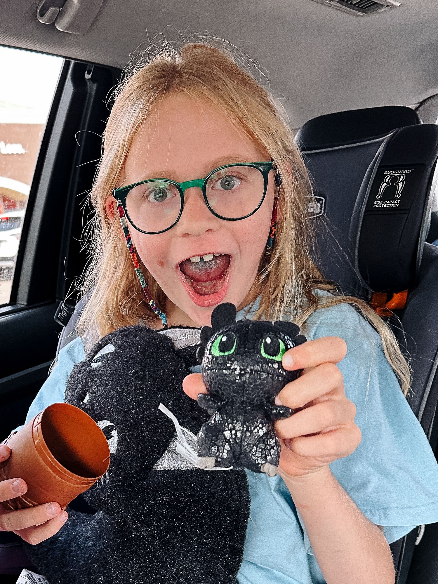 Project 365 photo - young girl with Toothless stuffy.