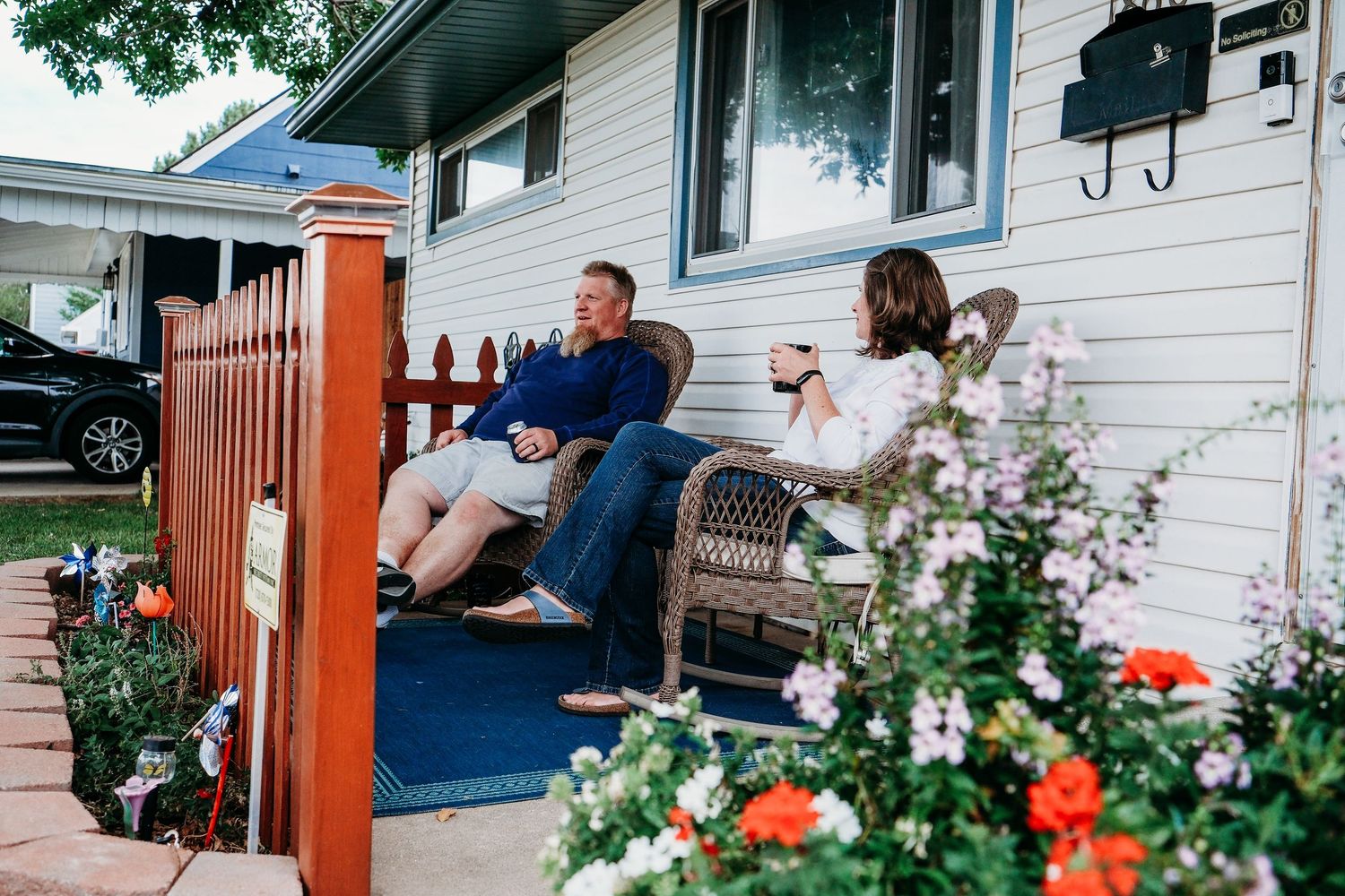 In-home Denver family photography session,  family of four in front yard of Denver home.
