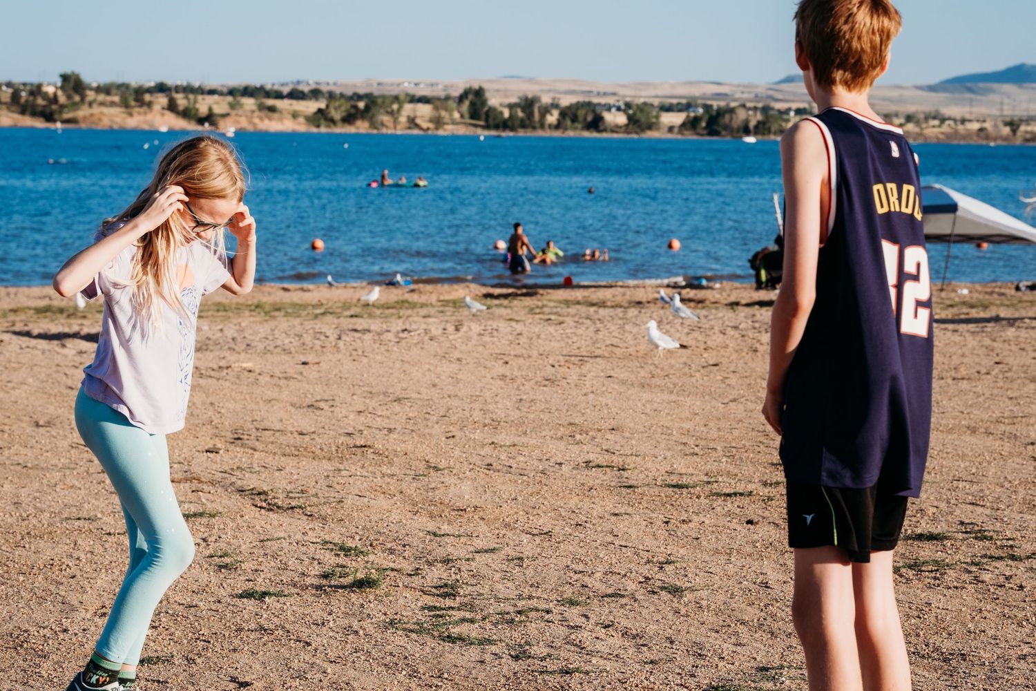Project 365 photo - two children standing in front of state park lake in Colorado.