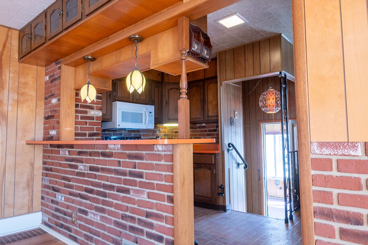 MLS Listing photo brick vintage kitchen craftsman style home Denver Colorado professional Denver photographer.