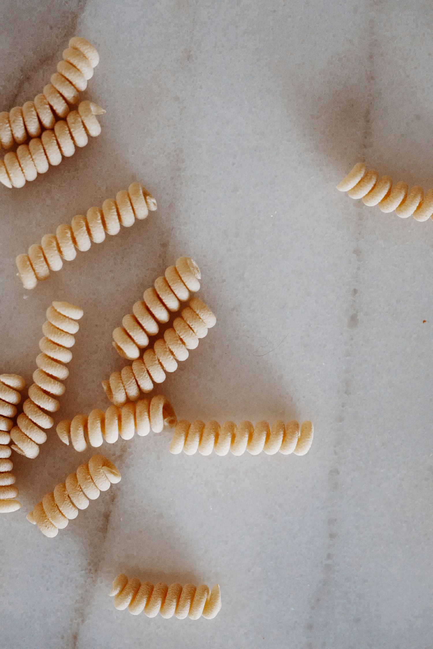 Close up of curly dry pasta.