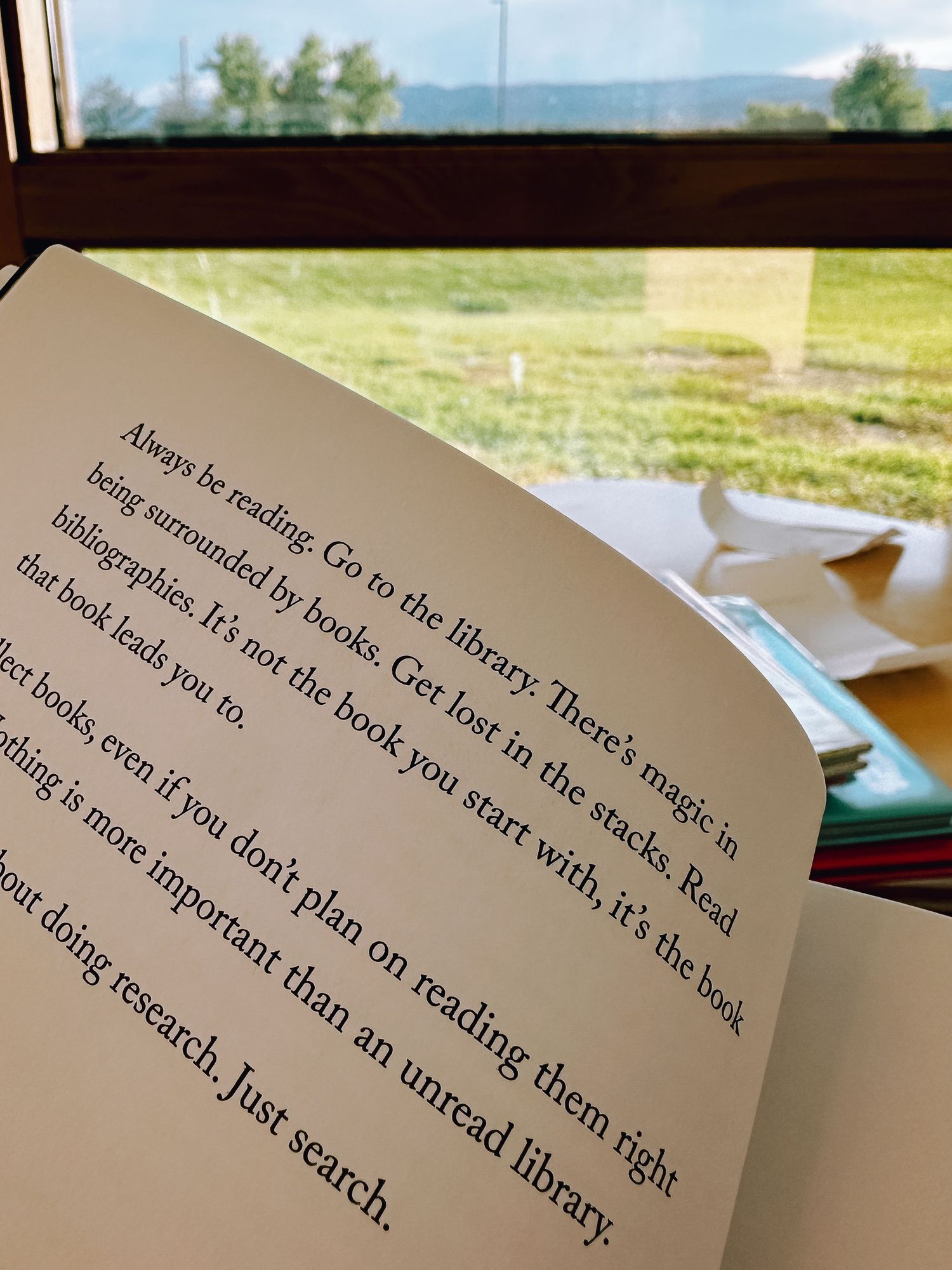 Project 365 photo - book open with words on page at library.