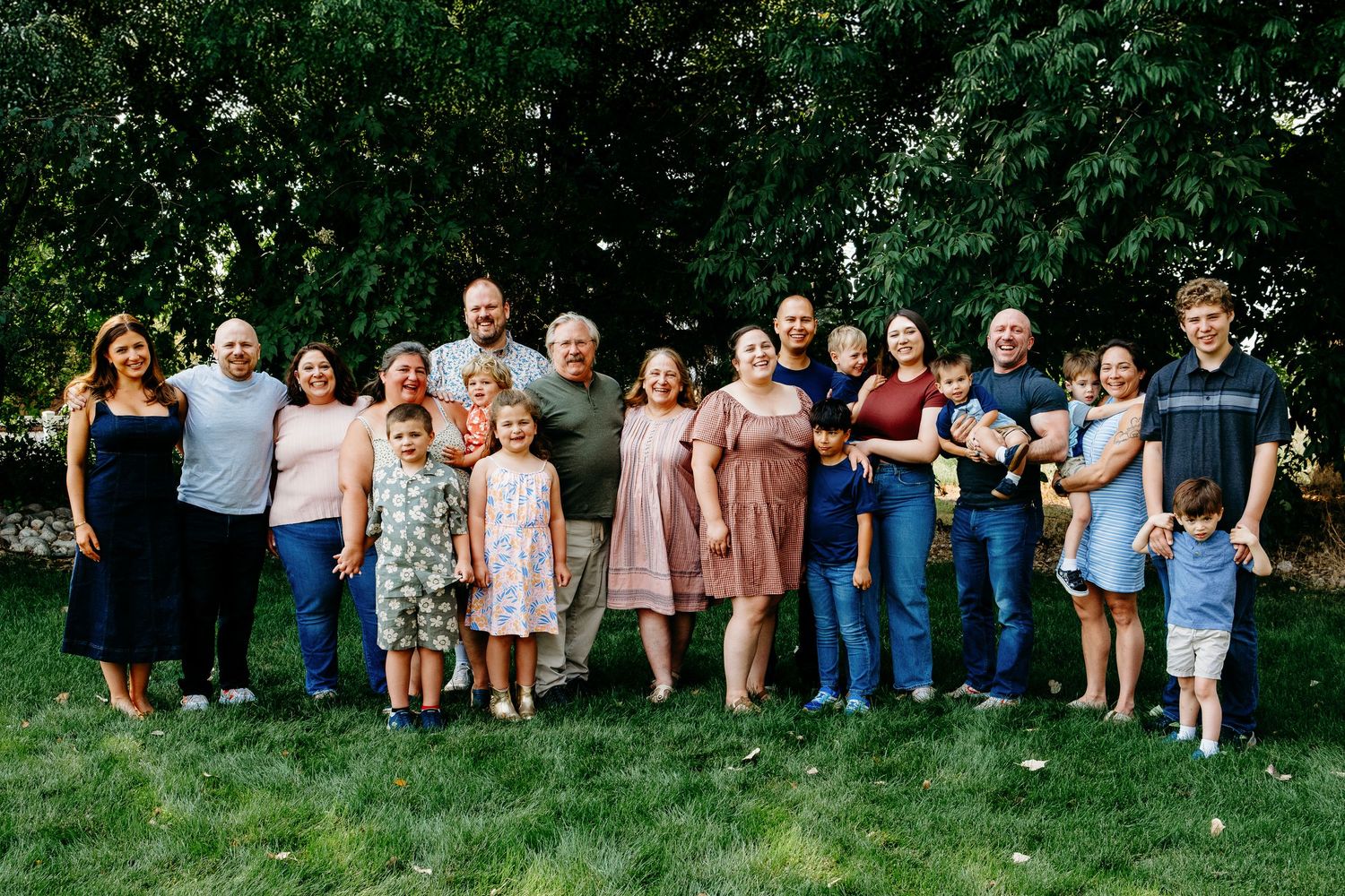 Three generations family photo in outdoor photo session in Golden, Colorado.