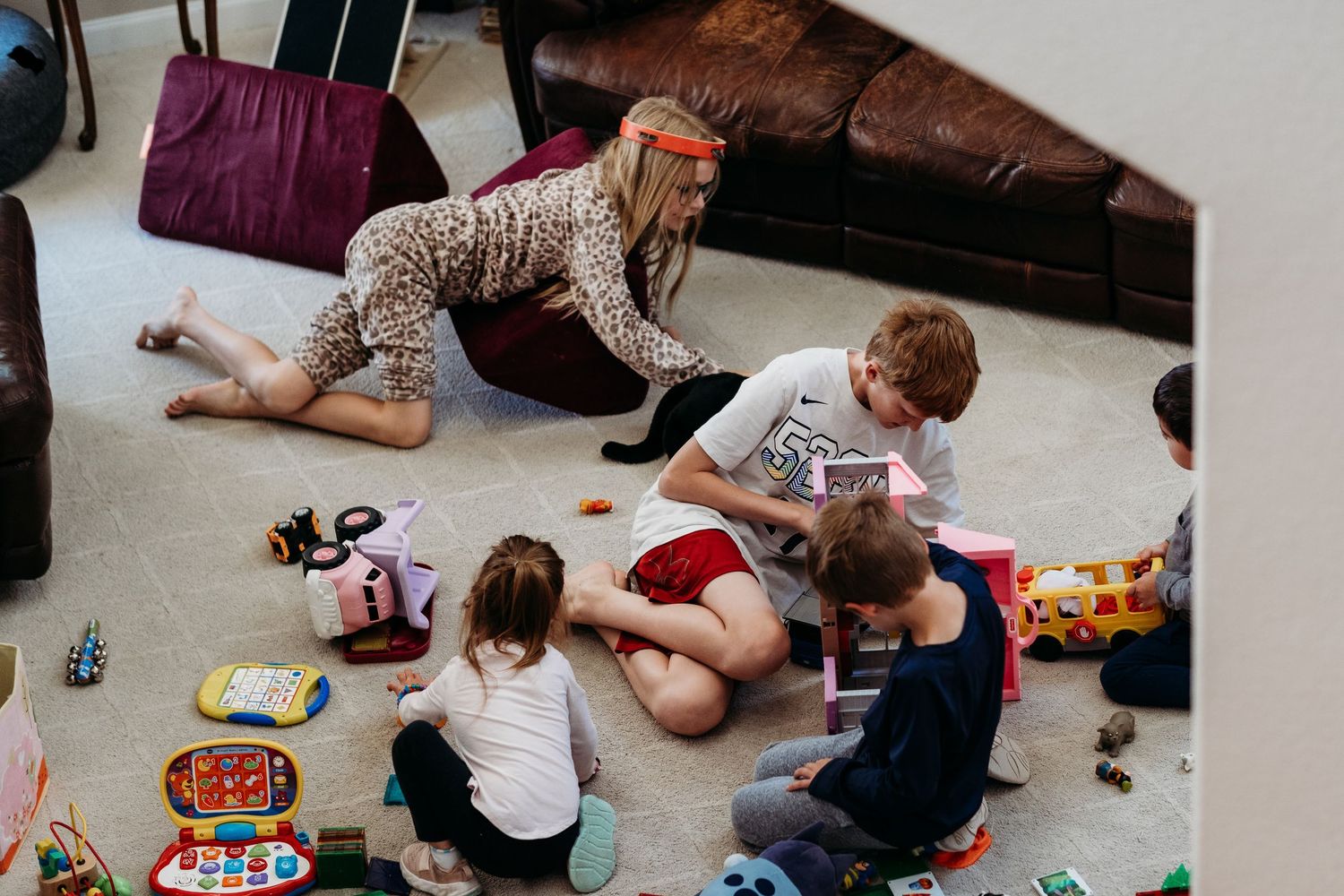 Project 365 photo - group of children playing with toys in living room.
