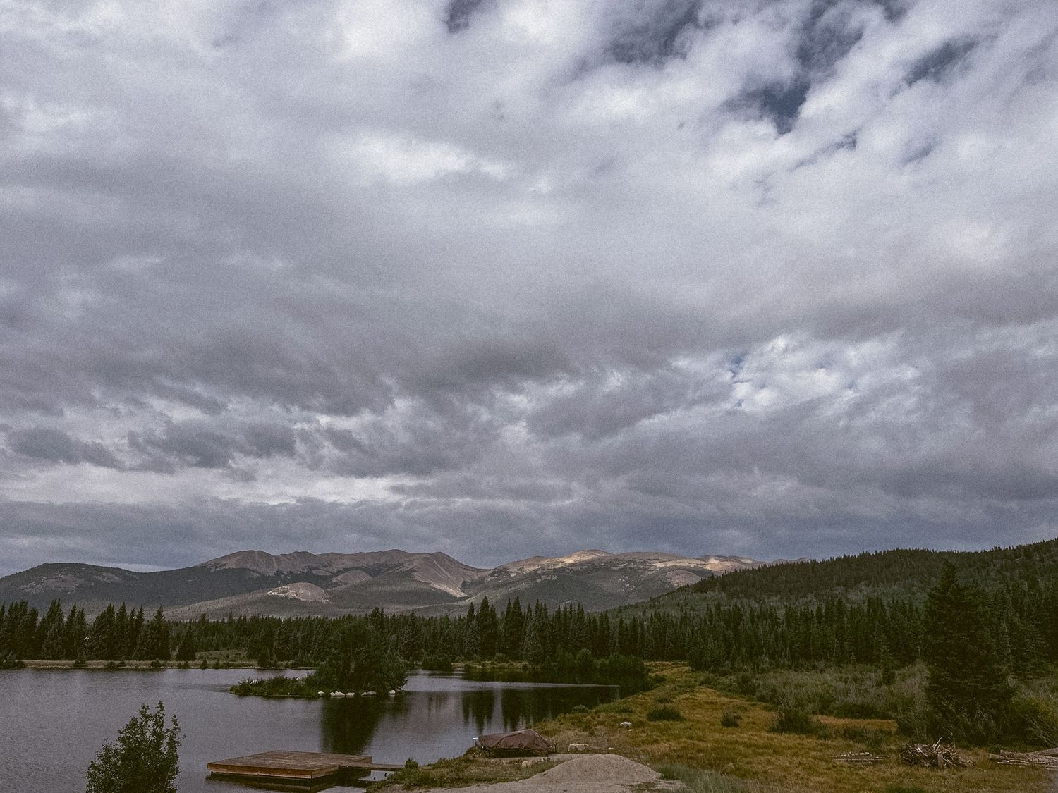 Project 365 photo - mountain with overcast skies and small pond.