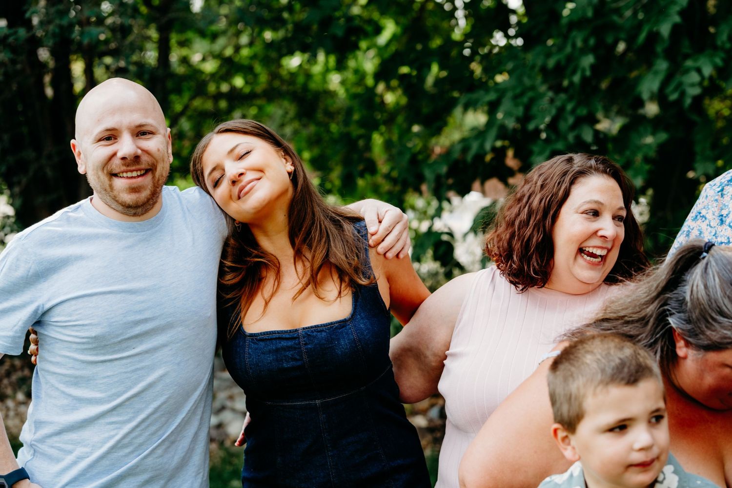 Adult siblings smiling together.
