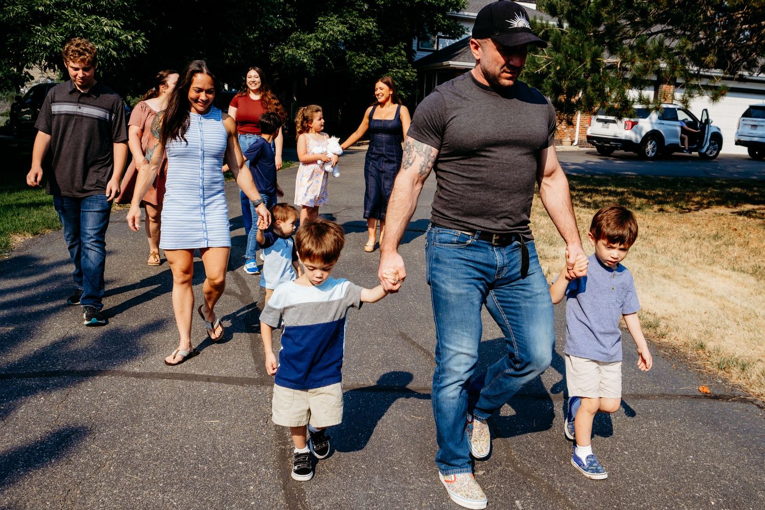 Documentary family photo of family walking.