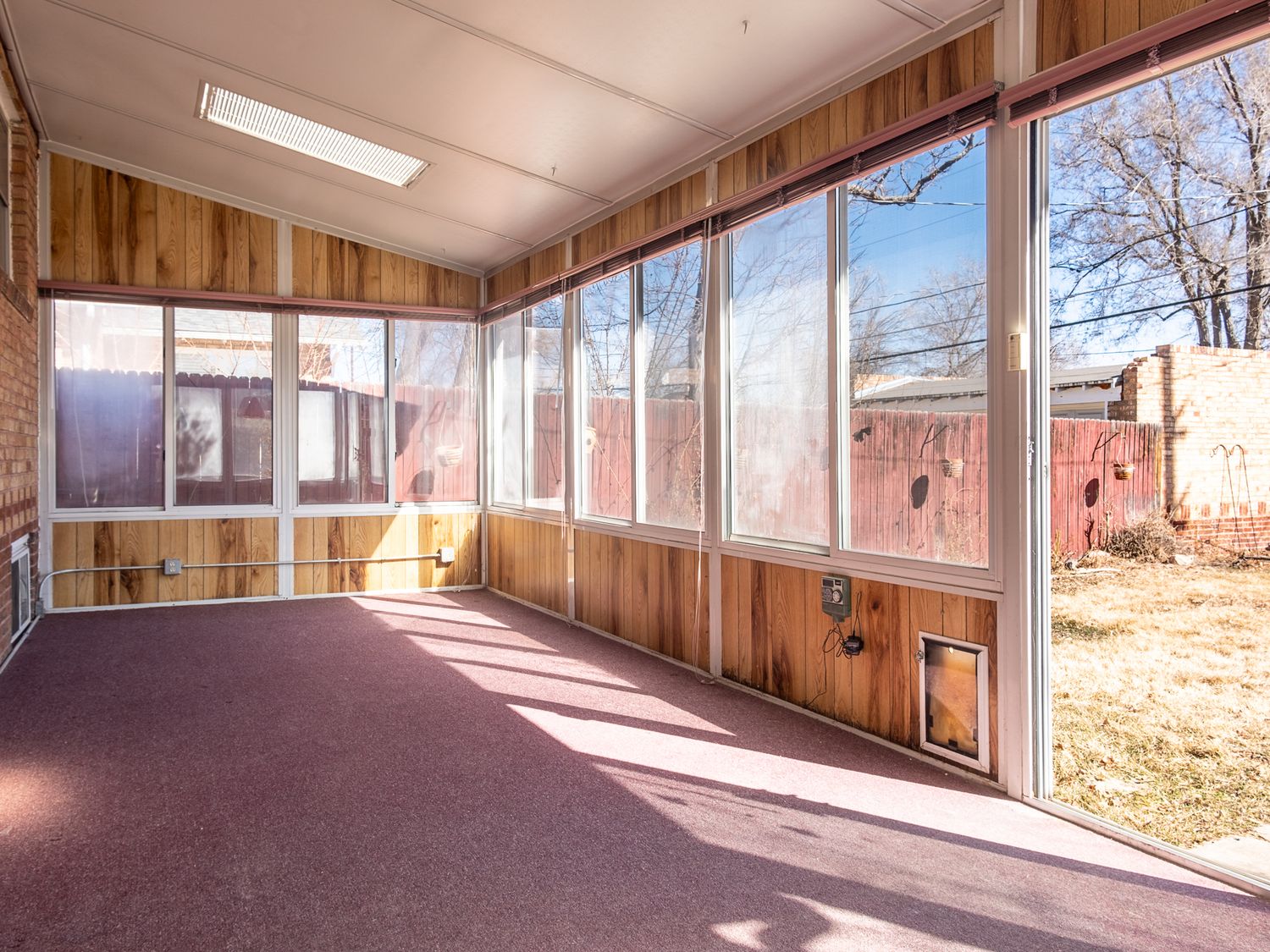 MLS Listing sunroom photo craftsman style home Denver Colorado professional Denver photographer.
