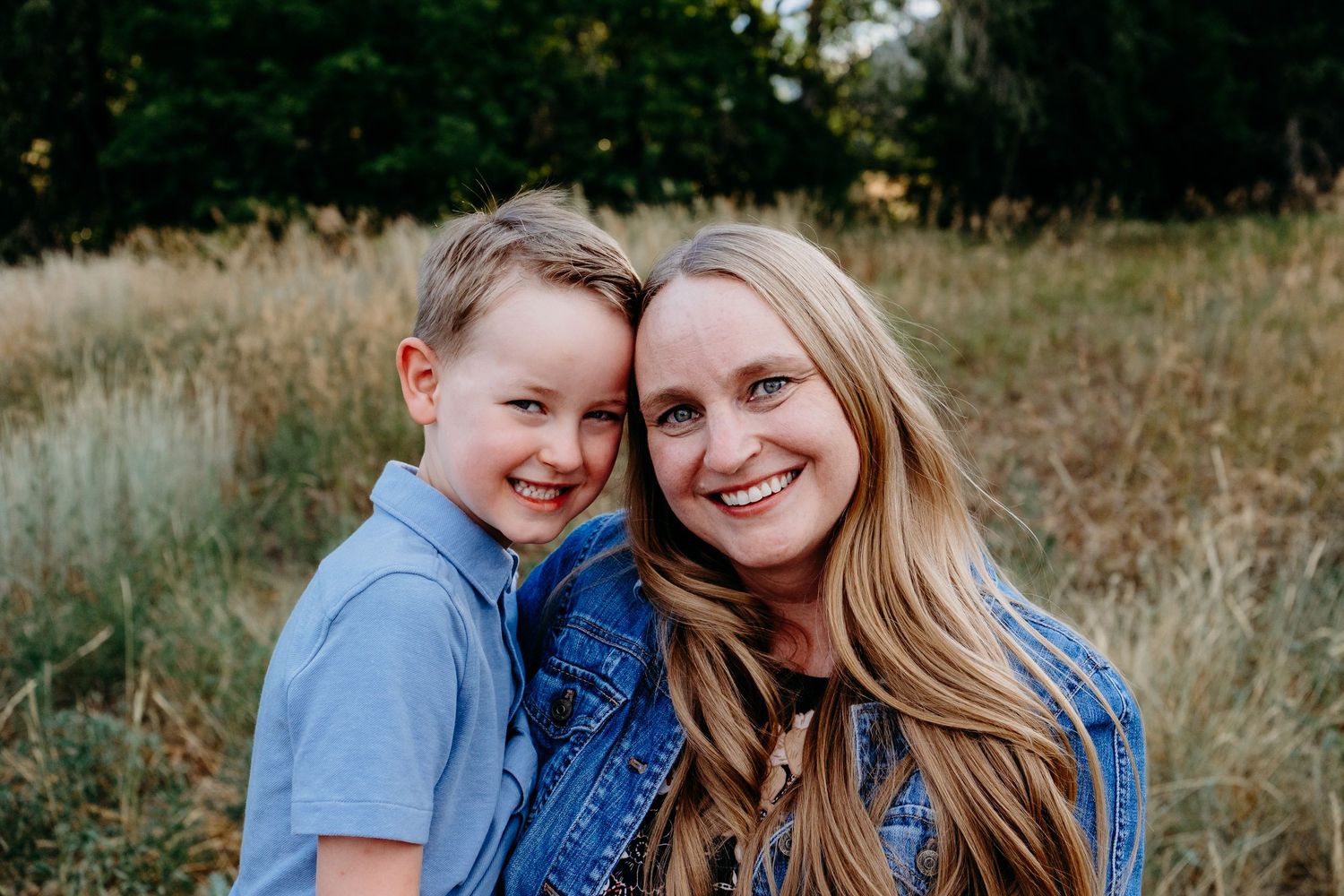 Mother and son snuggling together.