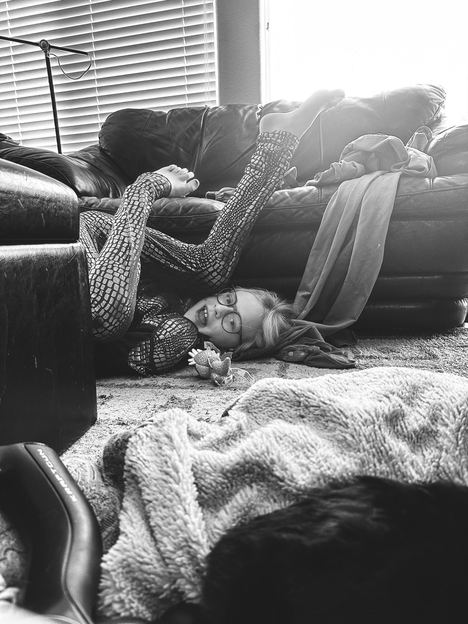 Project 365 photo - young girl playing on the carpet.