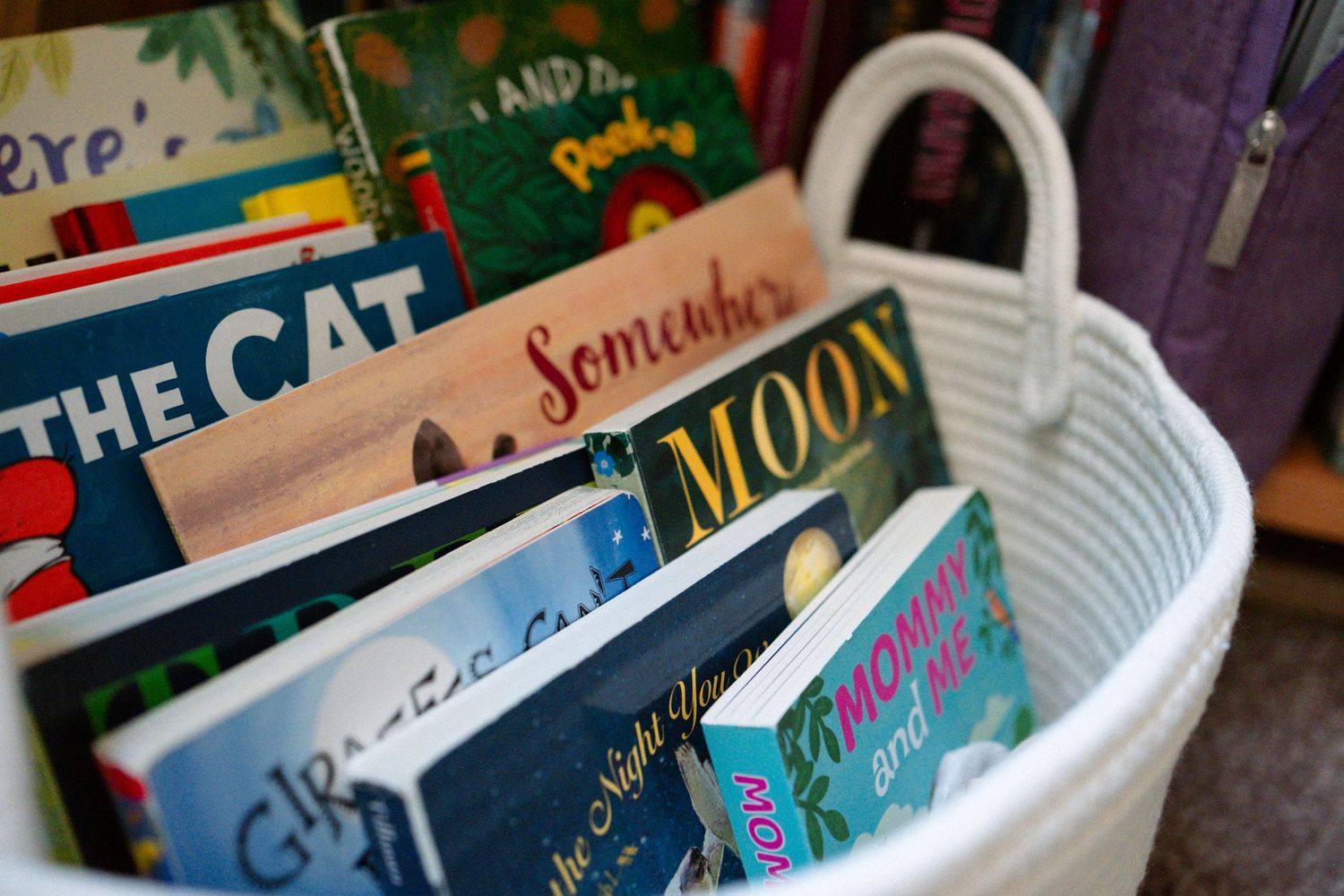 Newborn photo session detail photo, close up of baby board books.