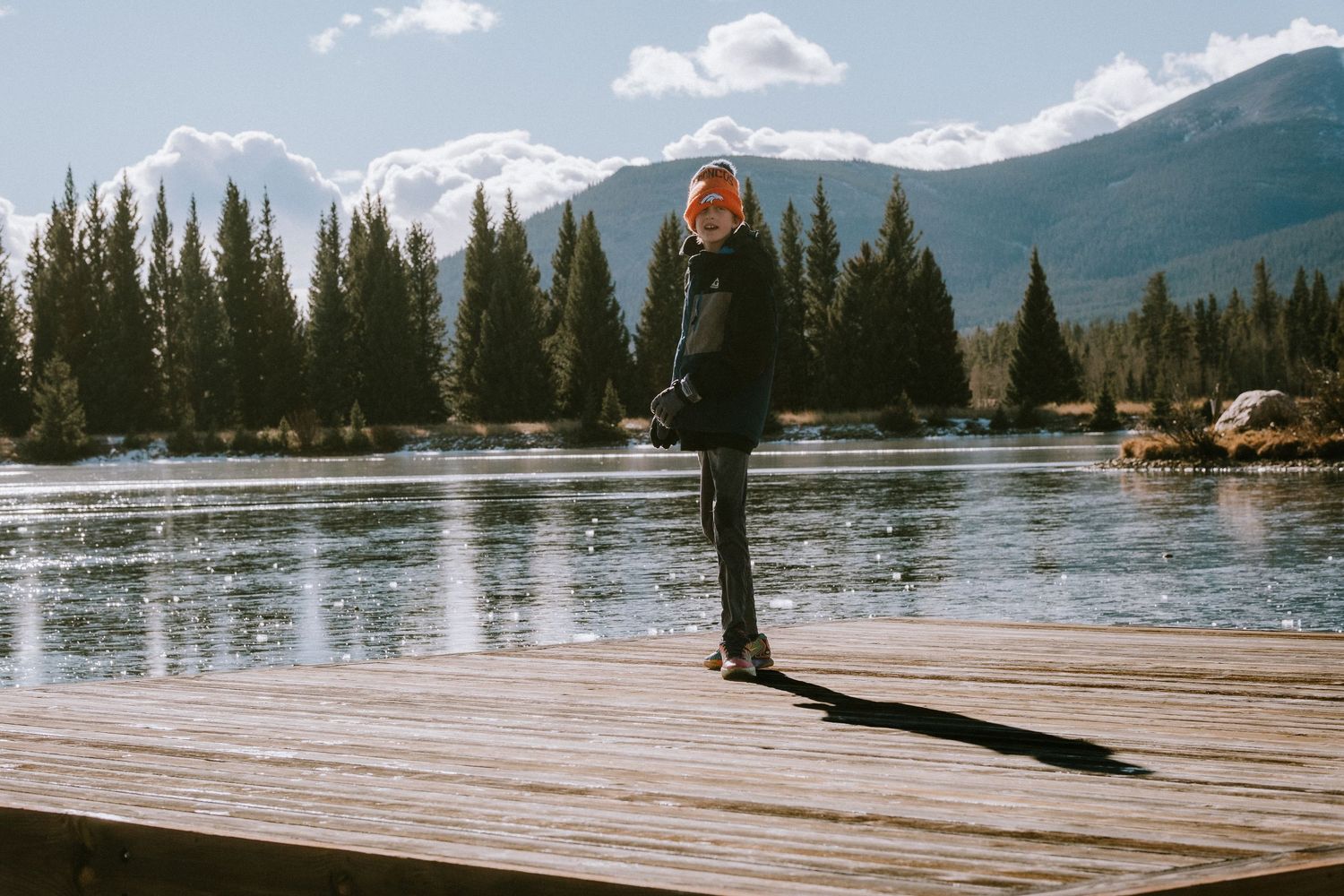 Project 365 - boy standing on dock in mountains of Colorado.