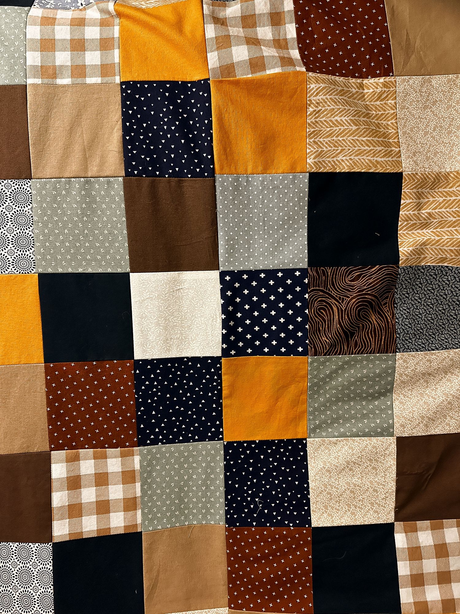 Project 365 - blue and yellow square patch quilt.
