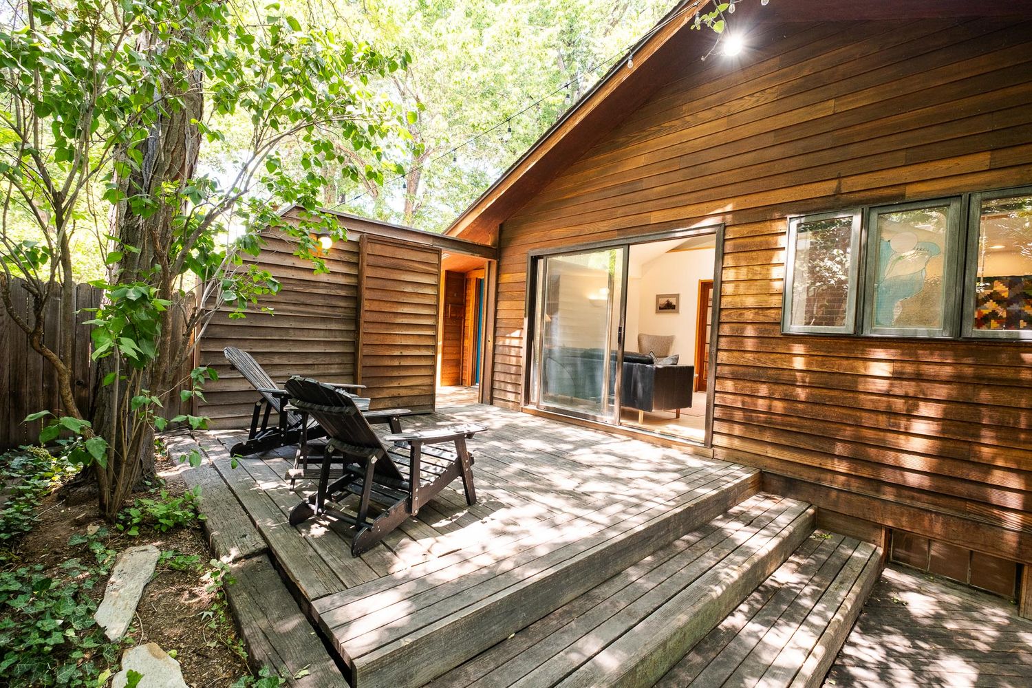 Airbnb photo Denver Colorado professional Denver photographer, patio area off of kitchen, dappled light by trees.