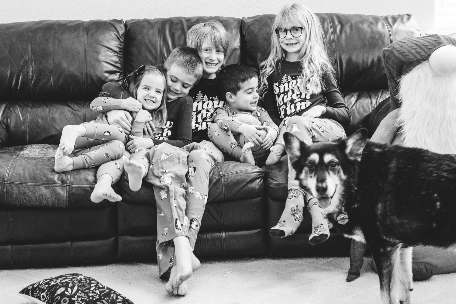 Project 365 - black and white of cousins snuggling on couch.