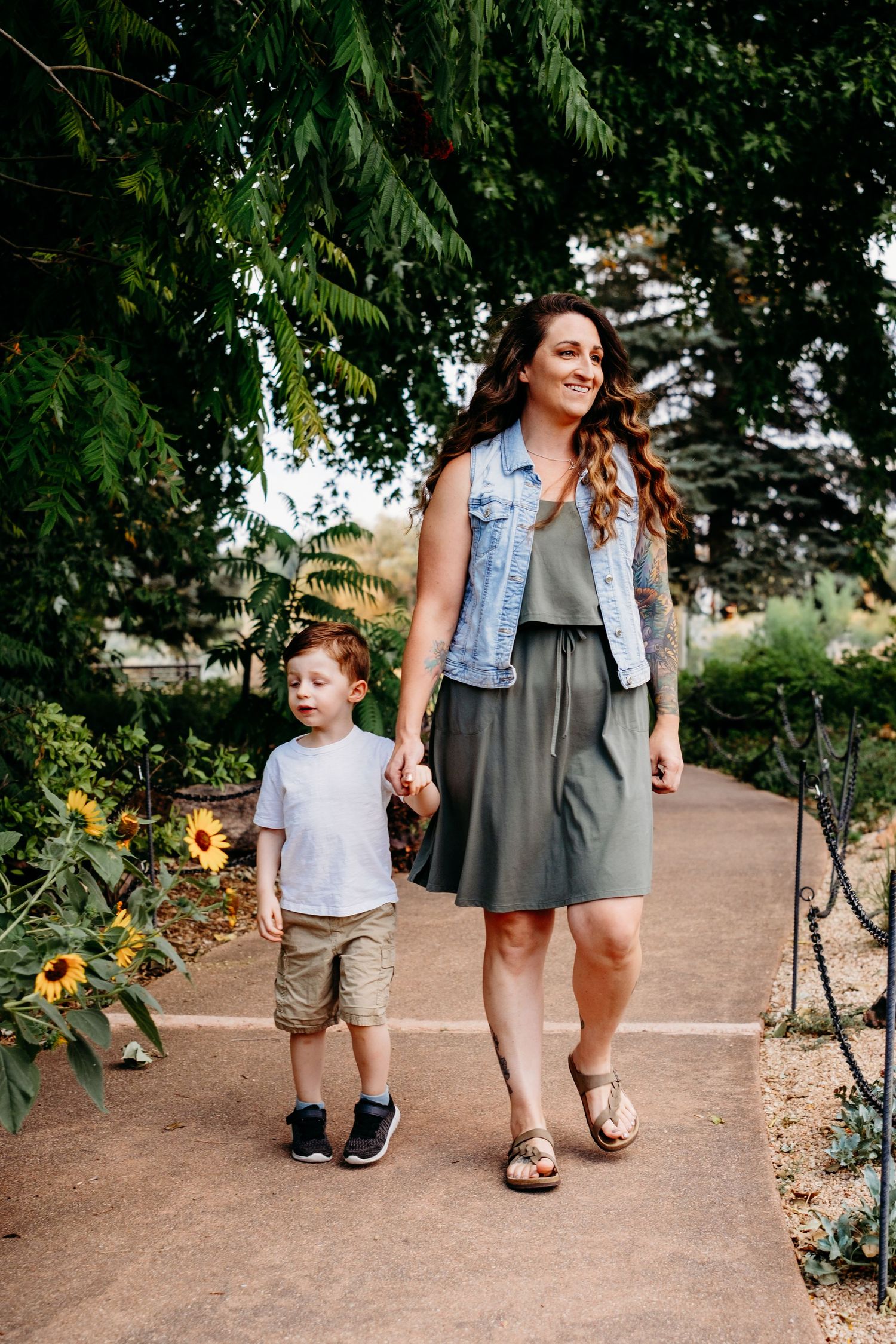 Mother and son walking on path at Arvada's Majestic View Park.