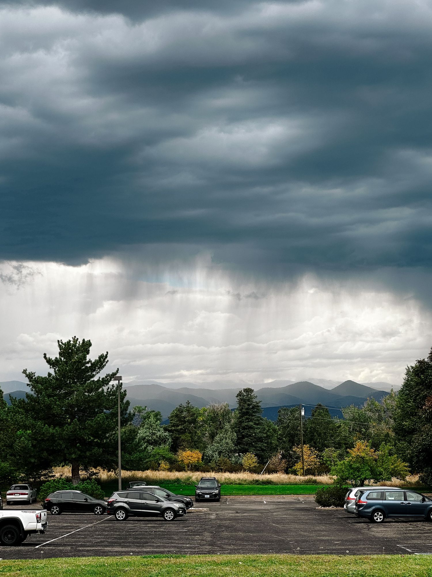 Project 365 photo - stormy skies from parking lot view.