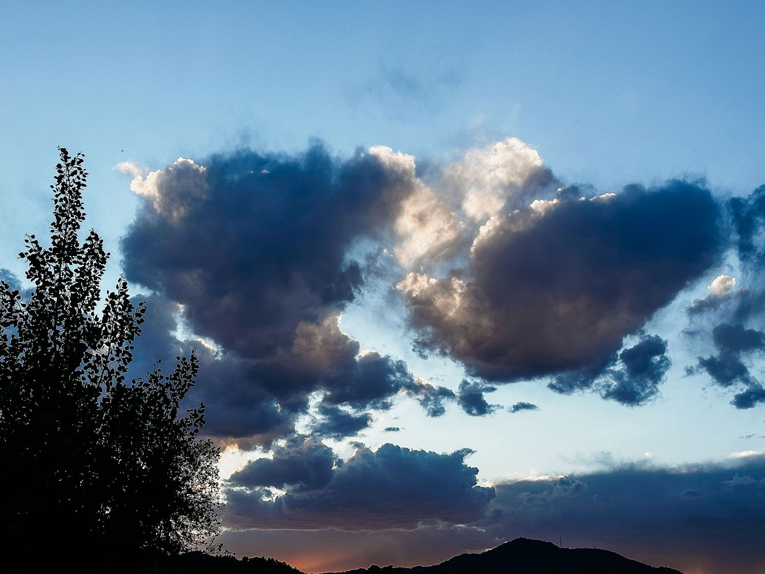 Denver photographer's project 365, May, moody cloudy skies at sunset.