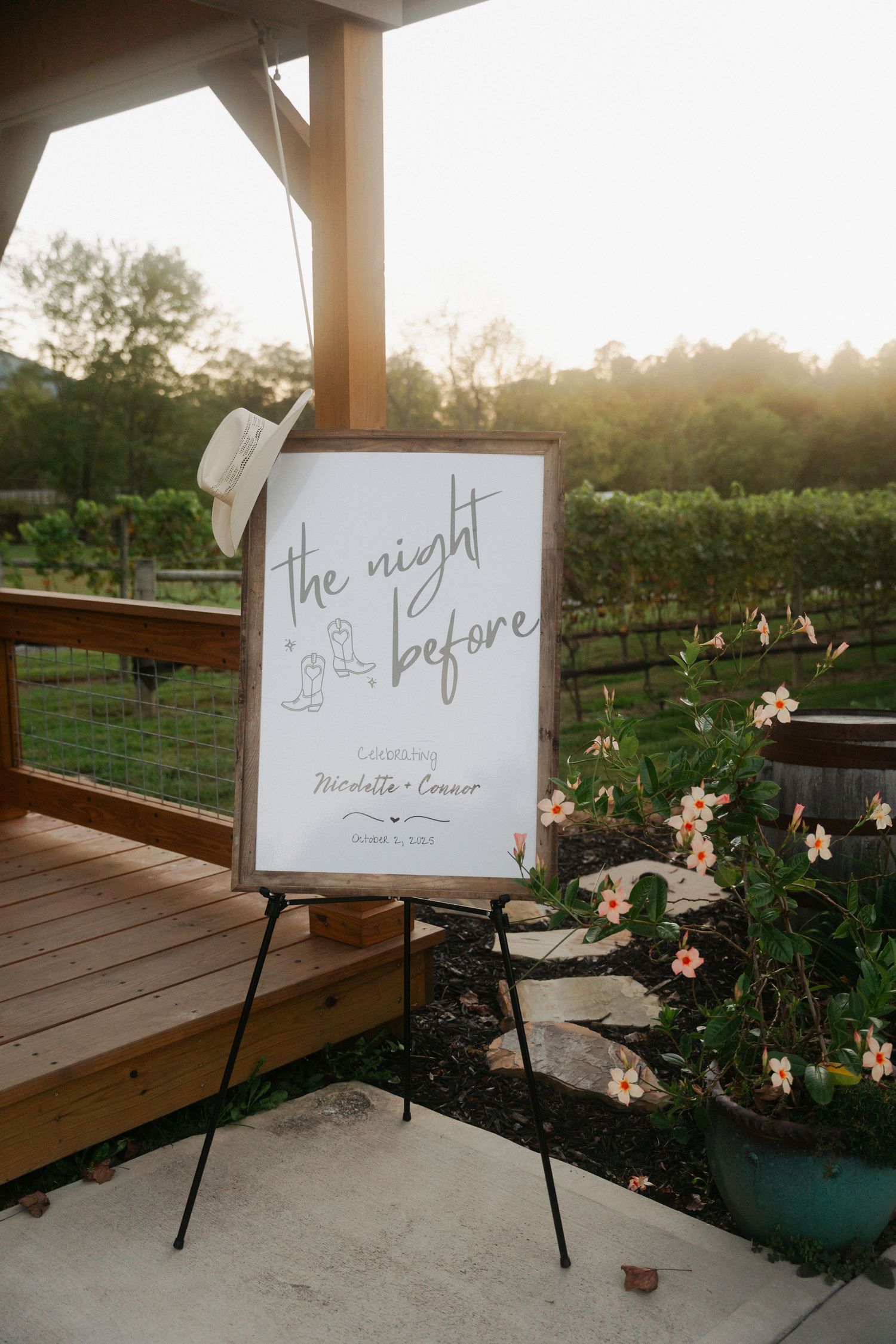 Rustic wedding rehearsal dinner welcome sign on easel reading \