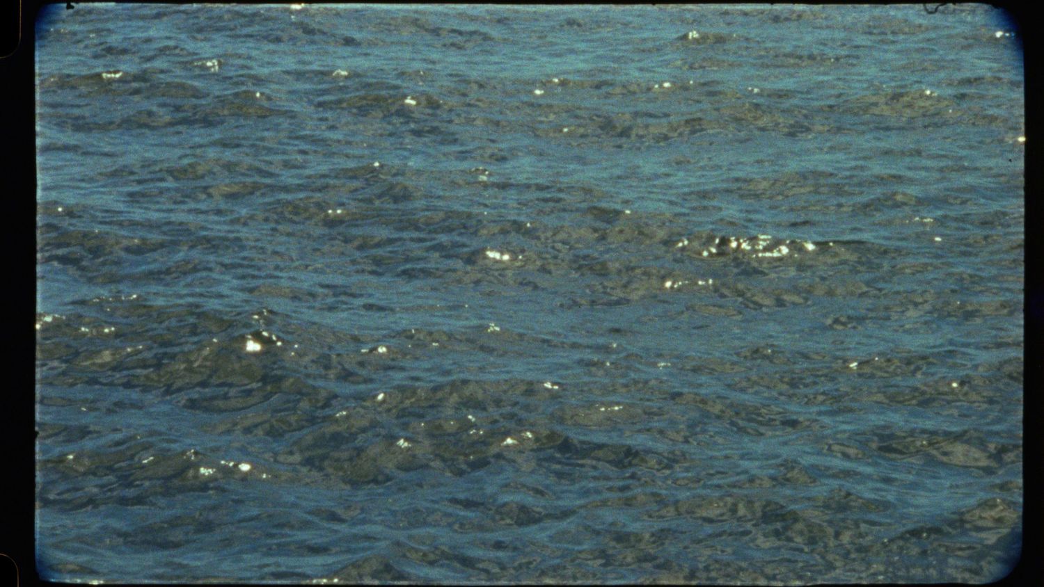 Rippling blue ocean water captured in a series of connected frames.