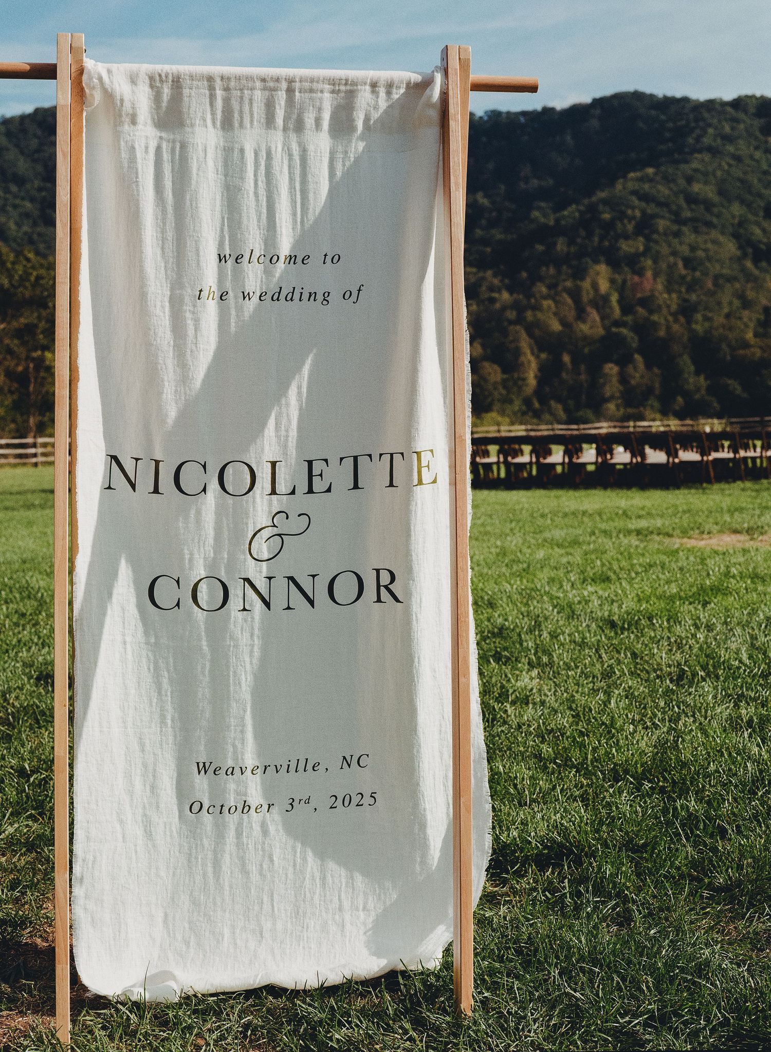 Elegant outdoor wedding welcome banner for Nicolette and Connor on October 3rd, 2025, in Weaverville, NC.