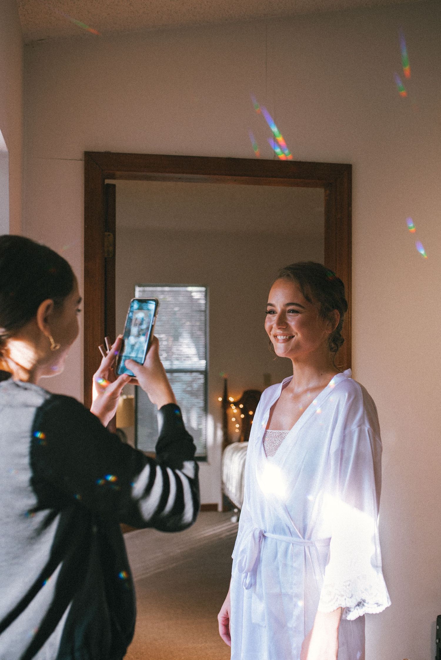 Getting ready scene with white robes and morning preparations.