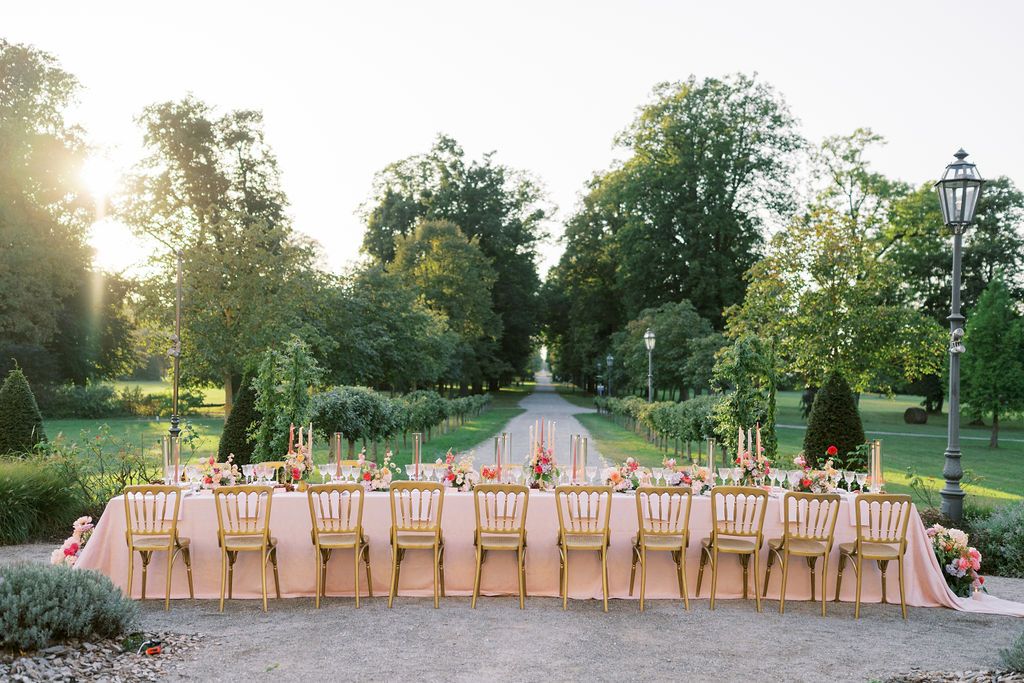 Outdoor ceremony setup with chairs at Schloss Eckartsau Austria — destination wedding photography