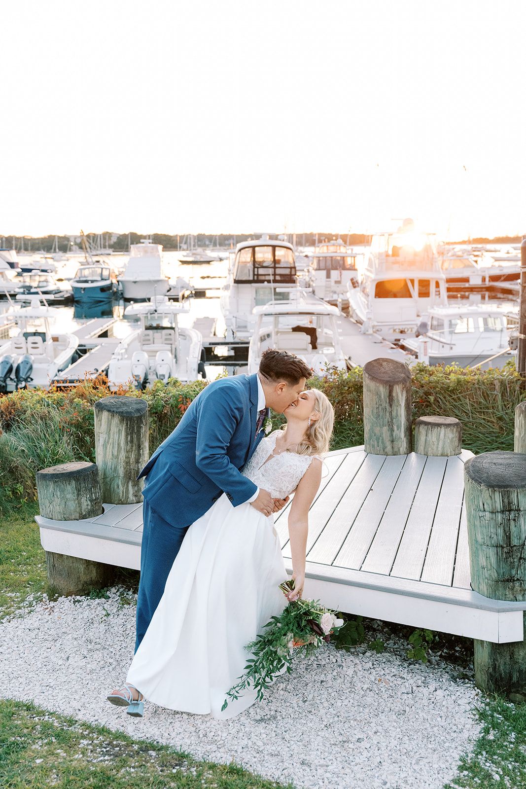 Anni and George's romantic kiss on the dock at Tupper Manor — Boston wedding photographer Helen Fang
