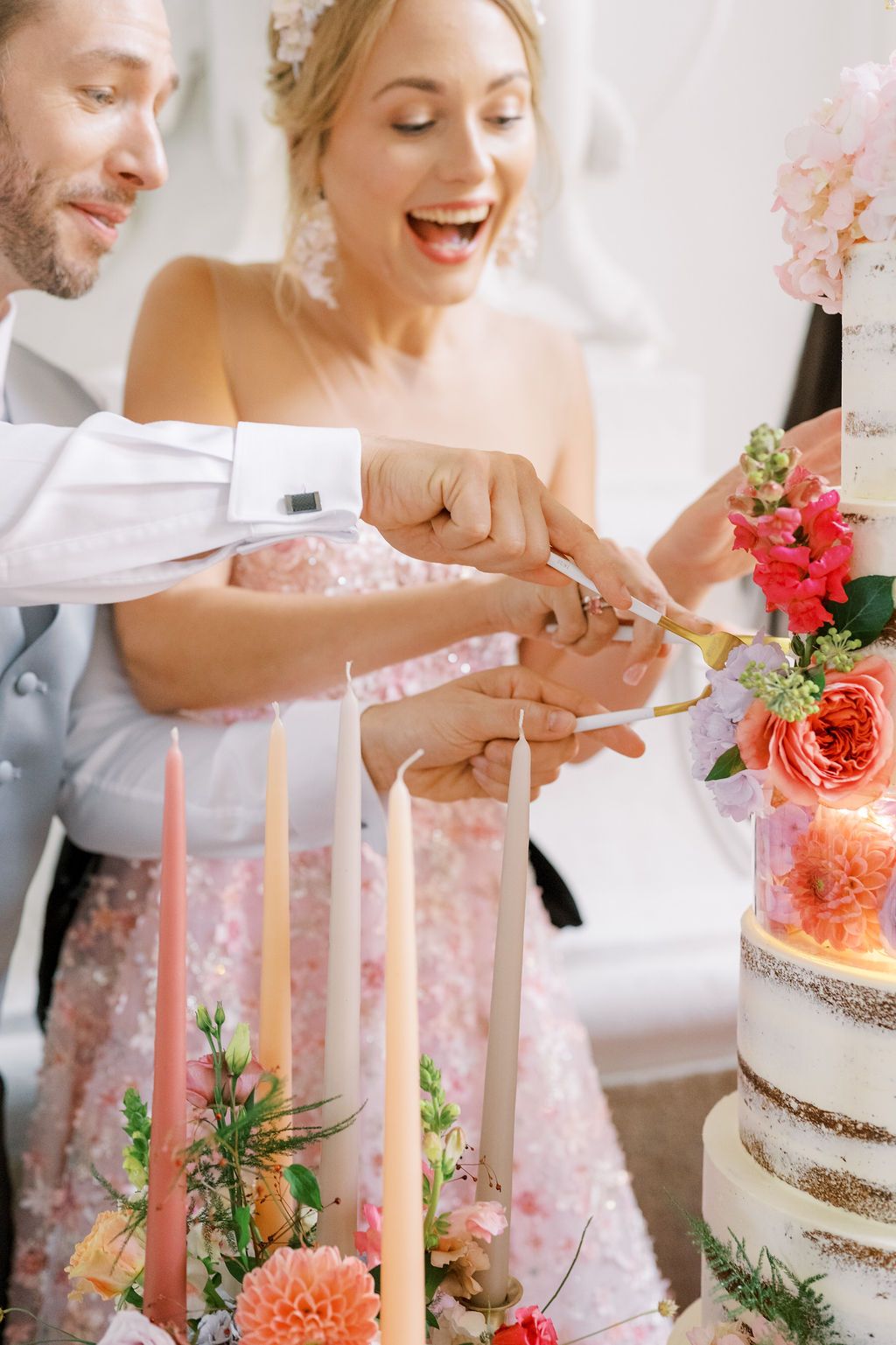 Wedding cake cutting at Schloss Eckartsau Austria styled shoot — European destination wedding photography by Helen Fang Studio