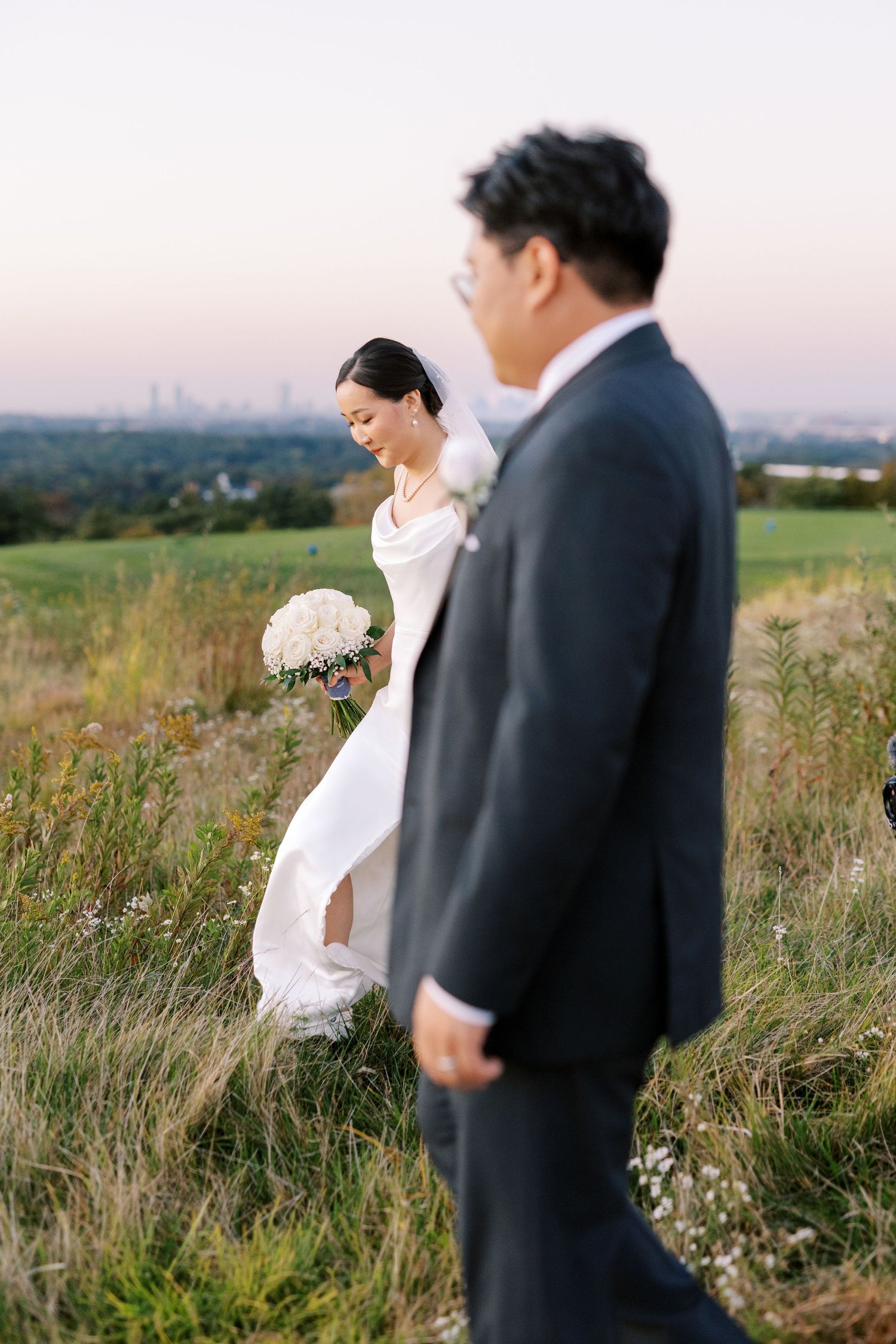 Groom portrait at golden hour overlooking the water — Boston wedding photographer Helen Fang Studio