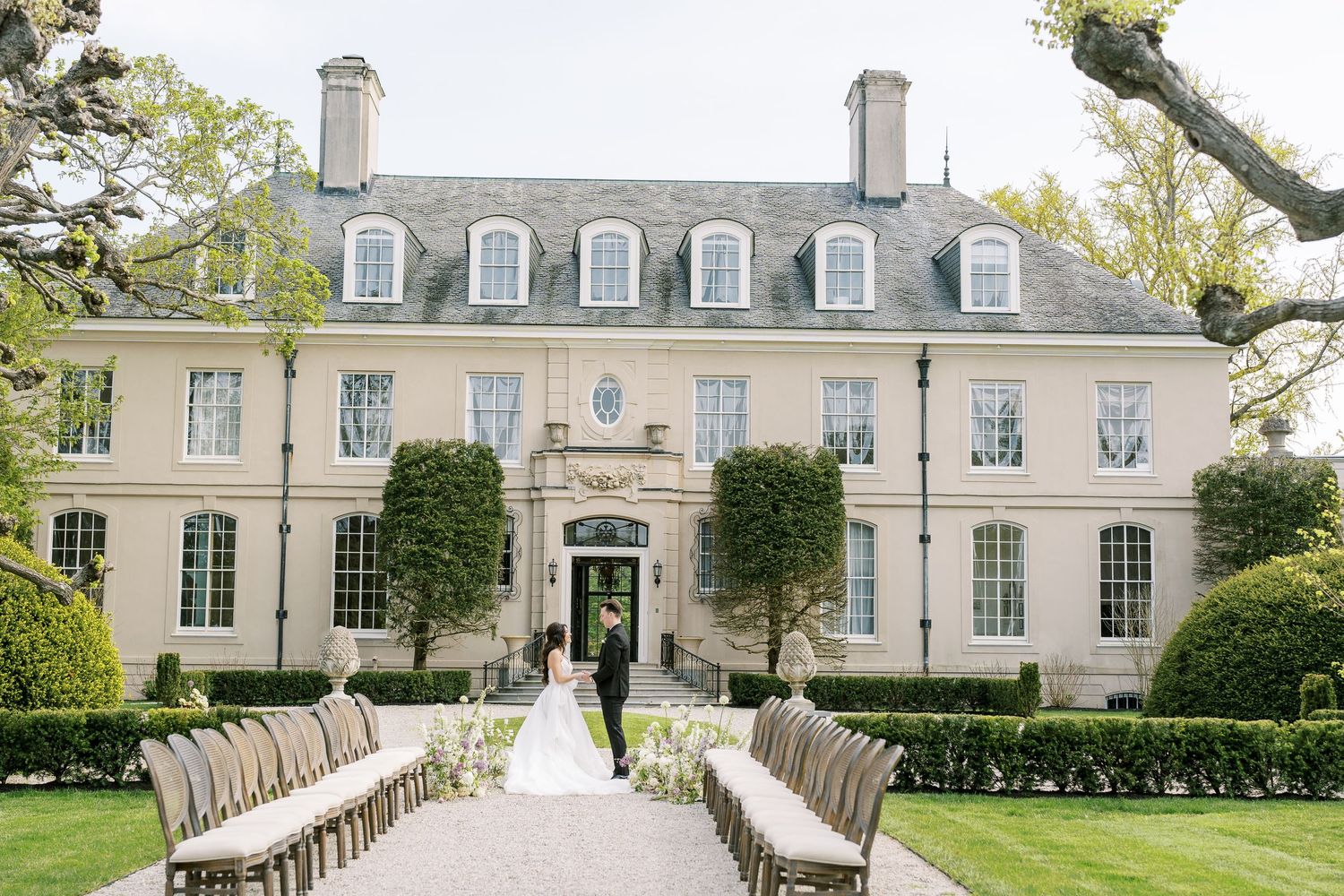 Grand estate wedding venue with formal garden pathway — Boston wedding photographer Helen Fang Studio