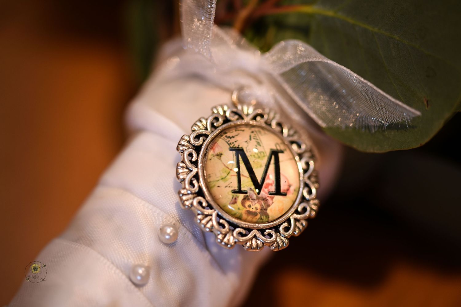 Elegant wedding detail shot showing decorative monogram designs.