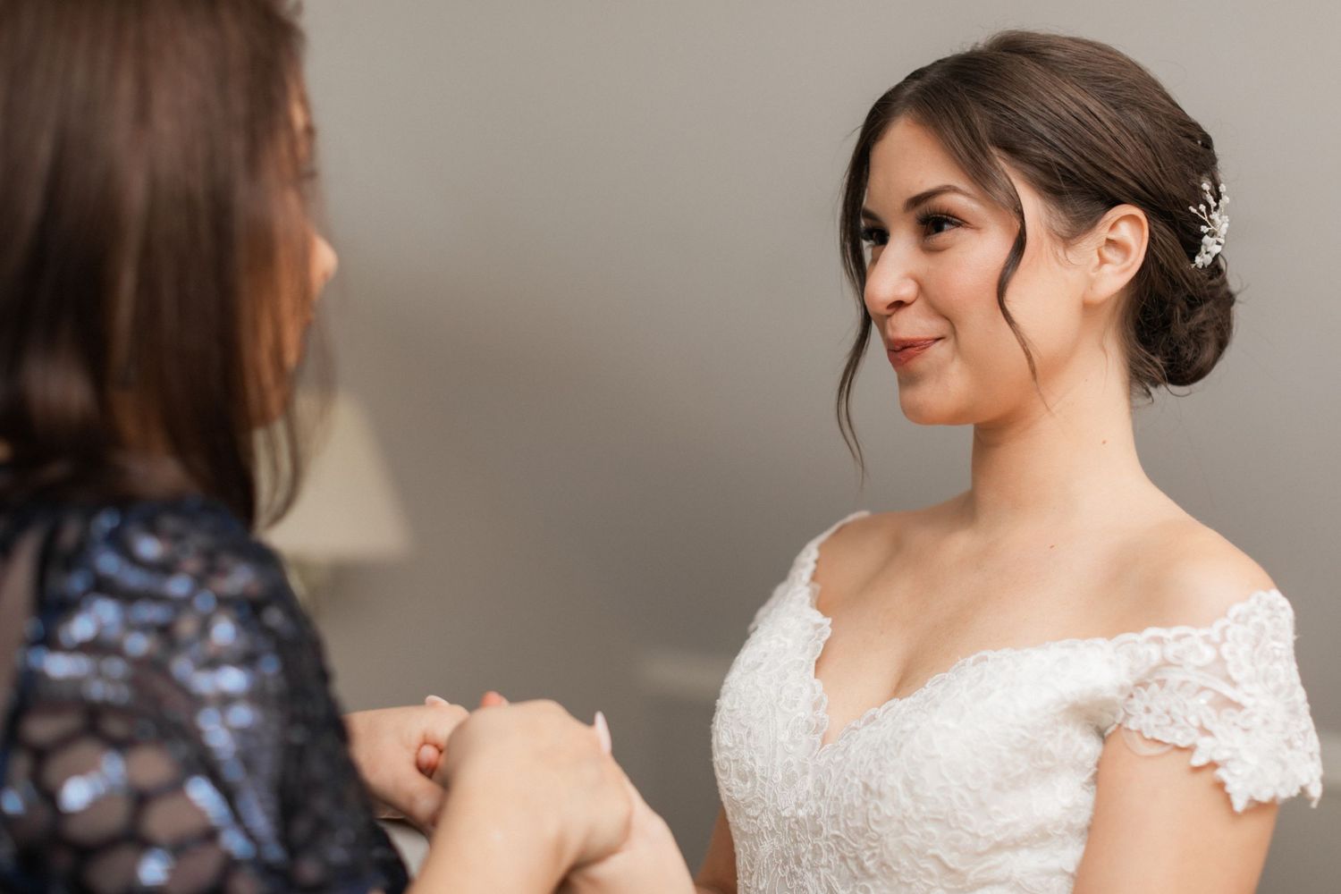An intimate pre-wedding conversation captured in soft lighting.