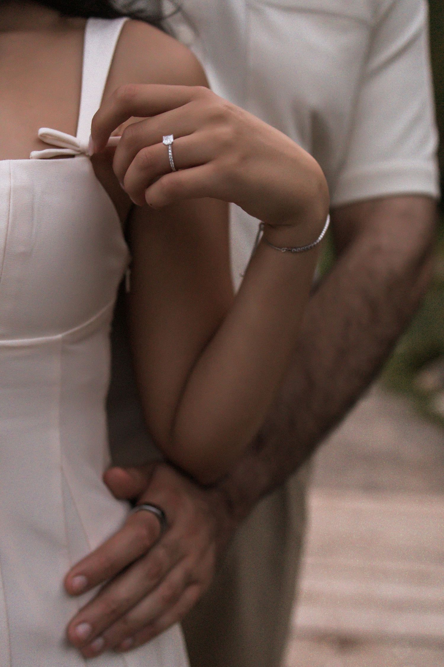 Close-up sequence showing hands exchanging wedding rings during a ceremony.
