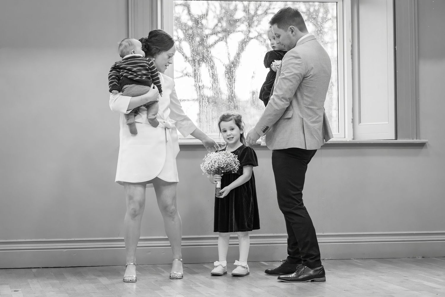 A black and white photo series showing intimate moments of a couple embracing in various dance-like poses.