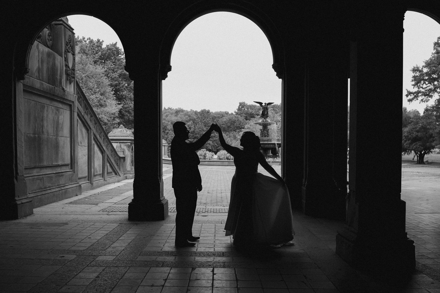A series of black and white architectural photographs showing covered walkways and archways in a minimalist style.