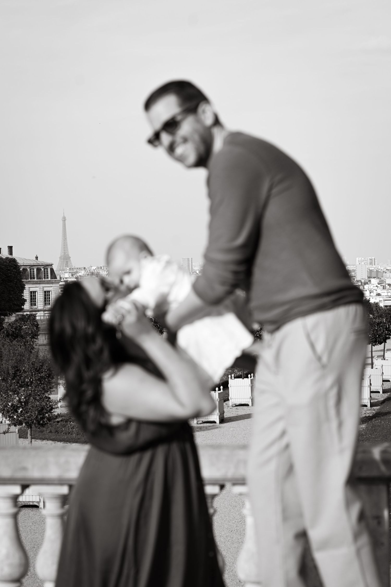 Vintage black and white photo sequence showing a couple dancing together in an outdoor setting.