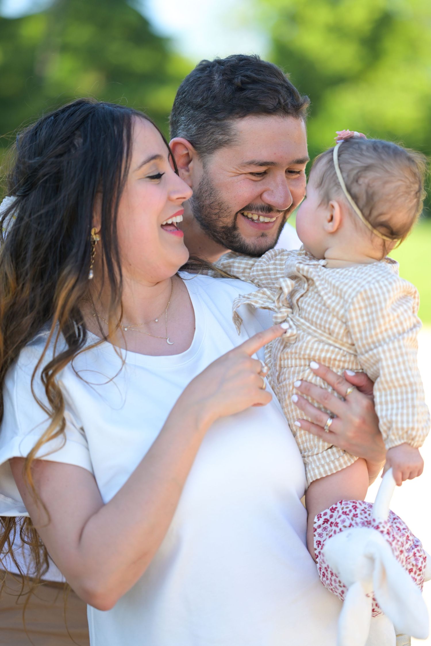 A joyful family moment captured in a series of candid outdoor photos.