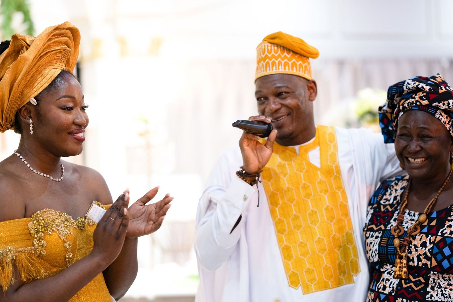 Collage of celebratory moments featuring traditional African attire in yellow and white.